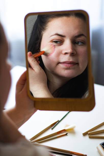 Makeup and Beauty Products including lip gloss, foundation, makeup kit, blush, eye shadow, lipstick, nailpolish isolated