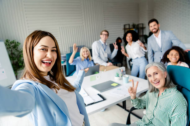 istock Team enjoying collaboration and cheerful moments in a modern professional office environment 2196745338