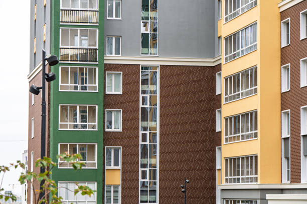 istock Colorful modern apartment buildings with decorative facades 2196749918