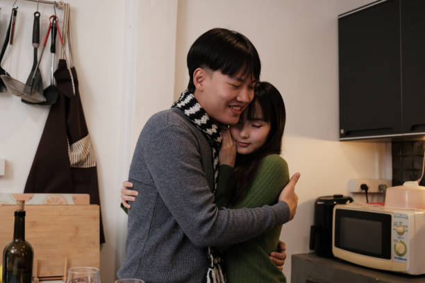 istock Young Asian couple living at home 2196754843