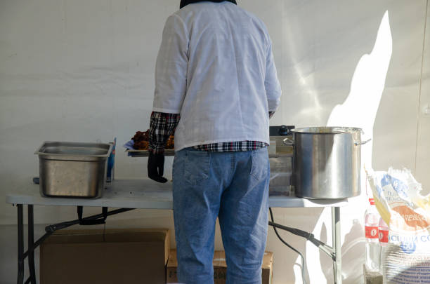 The process of cooking in an outdoor kitchen