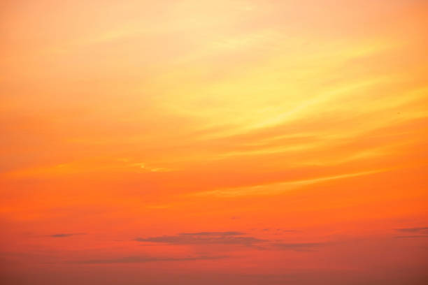 istock Sky,sunset, beautiful , luxury soft gradient orange gold clouds and sunlight on the blue sky perfect for the background, Sunrise on morning or everning in winter warm time ,Twilight summer,silhouette 2196759987