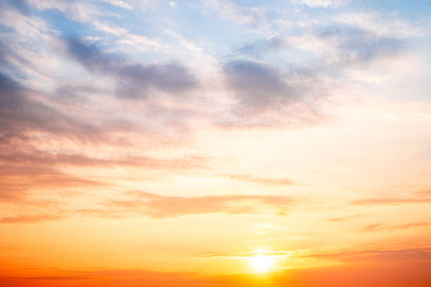 istock Sky,sunset, beautiful , luxury soft gradient orange gold clouds and sunlight on the blue sky perfect for the background, Sunrise on morning or everning in winter warm time ,Twilight summer,silhouette 2196760039