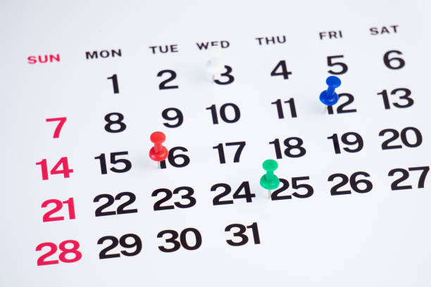 planning with push pin on the calendar