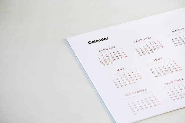 istock calendar paper on the table background 2196760217