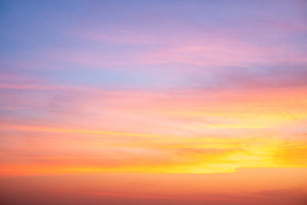 istock Beautiful , luxury soft gradient orange gold clouds and sunlight on the blue sky perfect for the background, take in evening,Twilight, Large size, high definition landscape photo 2196760586