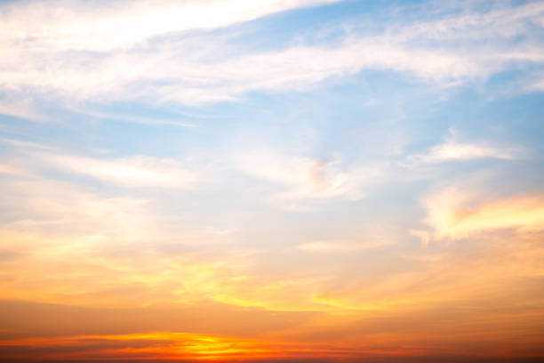 istock Beautiful , luxury soft gradient orange gold clouds and sunlight on the blue sky perfect for the background, take in evening,Twilight, Large size, high definition landscape photo 2196760741