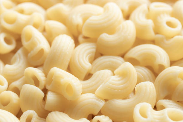 Heap of Cooked Pasta Elbow Macaroni. Close-up view