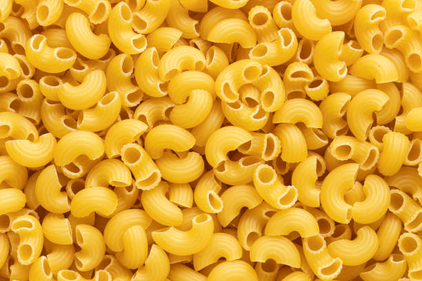 istock Top view of raw macaroni background 2196764698