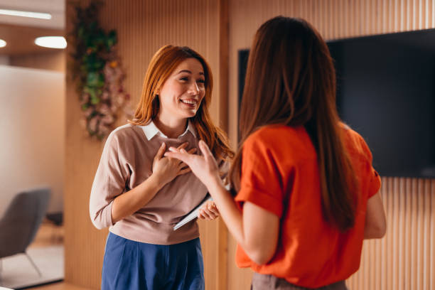 istock Two businesswomen discussing together in modern office 2196765342