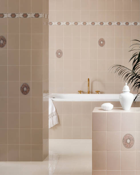 istock bathroom with tub and gold taps 2196765542