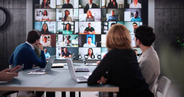 istock Tech-savvy executive leading corporate meeting via online video 2196768327