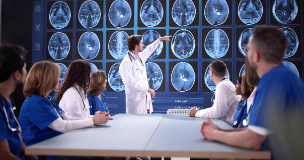 istock Medical Team Analyzing MRI Scan For Neurology Diagnosis 2196768388