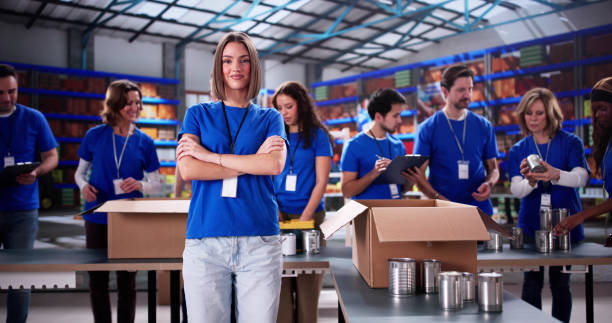 istock Diverse Charity Team Sorting Food Donations 2196768412