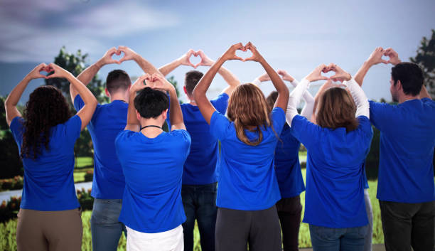 istock Multiracial volunteers create hearts, spreading love 2196768422