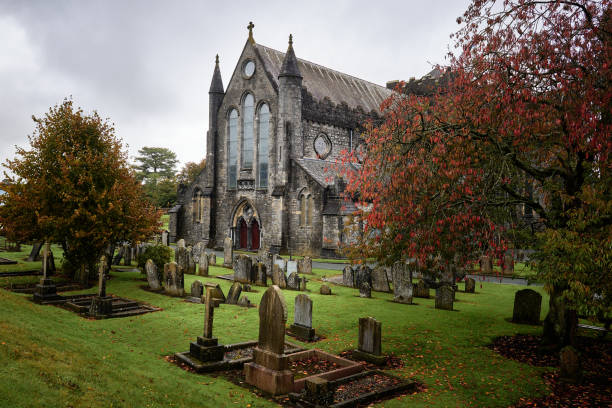 St Canice's Cathedral in Kilkenny, Ireland, a stunning example of medieval Gothic architecture, surrounded by an ancient graveyard. A historic and spiritual landmark rich in cultural and religious heritage.
