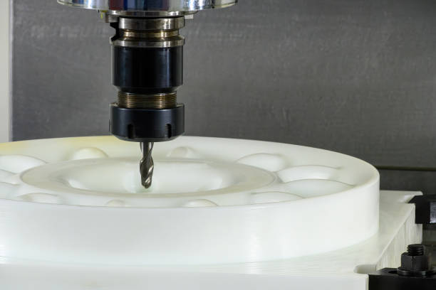 istock The CNC milling machine cutting the nylon parts with solid ball nose end mill tool. 2196769847