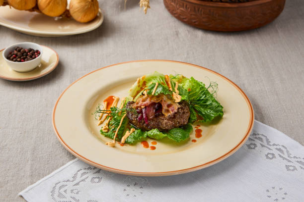 istock Gourmet Beefsteak with Lettuce A Study in Elegant Culinary Presentation 2196772840