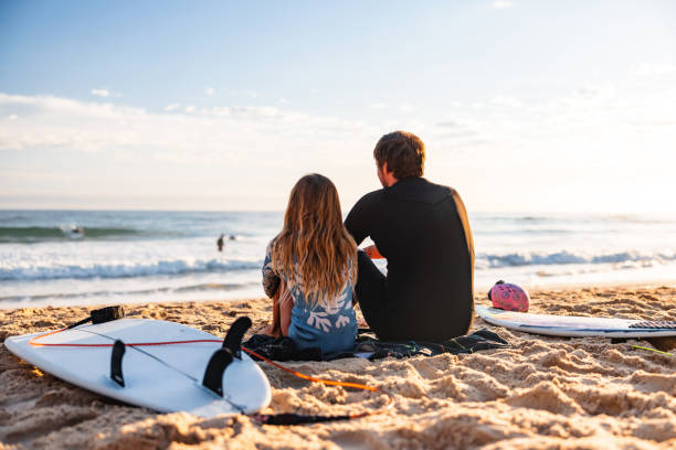 istock Father and Daughter on Gold Coast Beach at Sunrise 2196773378