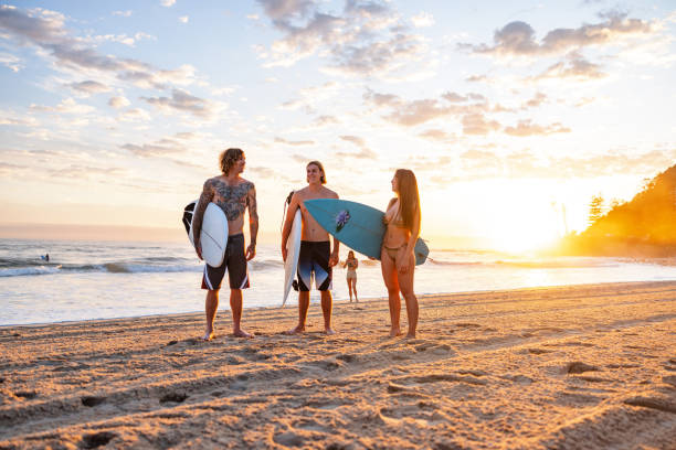 istock Surfers Enjoying Sunrise on Gold Coast Beach Australia 2196773384