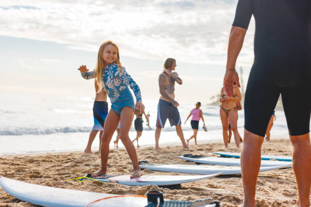 istock Young Girl Surfing Lesson on Gold Coast Beach 2196773403