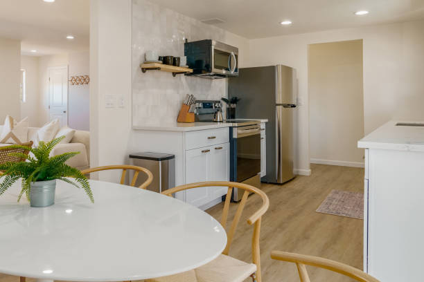 istock Modern Apartment Interior: Kitchen, Dining, and Living Area 2196777777