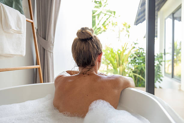 istock Woman Relaxing in Bathtub at Home Spa 2196782533