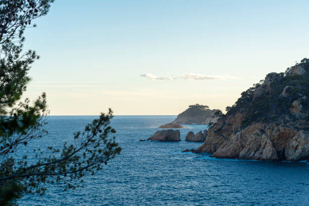 A Idyllic sunset in a cove on the Costa Brava