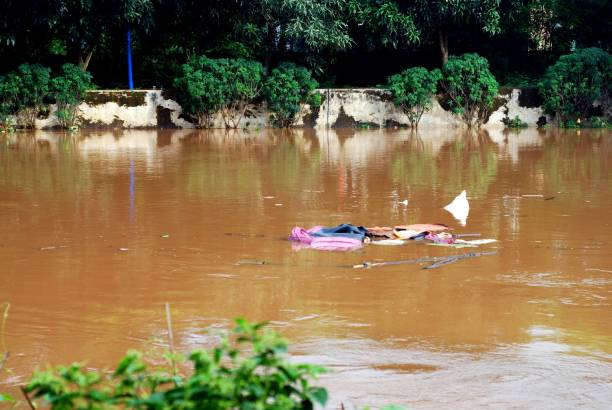 istock garbage floating in the river cause by flood 2196783956