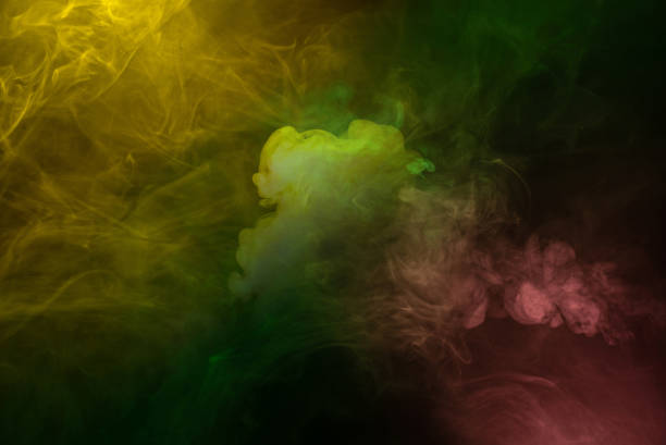 istock Yellow and pink steam on a black background. 2196788988