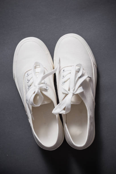 Convenient for sports mens sneakers on a grey background.