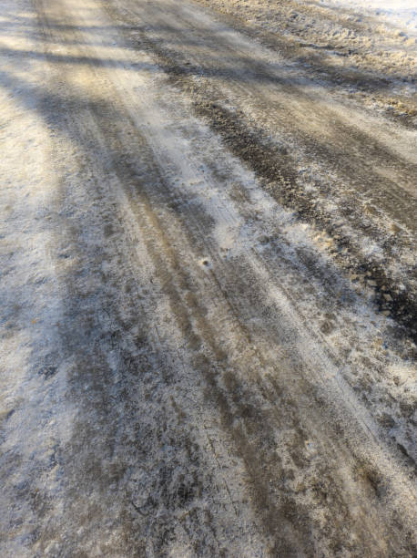 istock ice covered road at winter day 2196790981