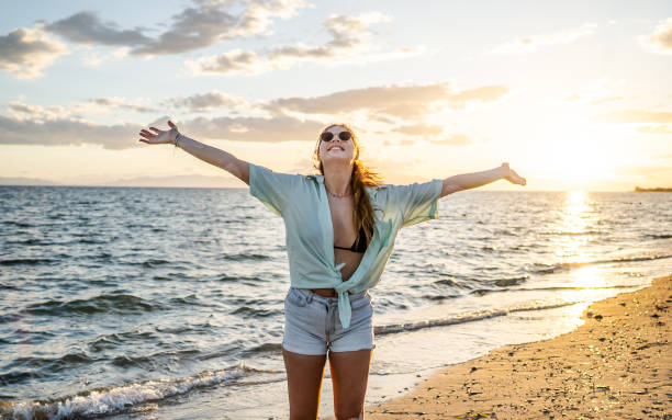 istock Woman enjoying her summer vacation 2196794371