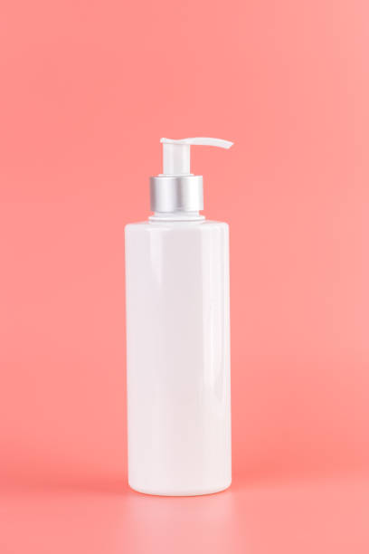 istock close-up on a soft pink background white glossy bottle with dispenser minimalist container for cosmetics beauty industry hermetic storage of liquids 2196794914