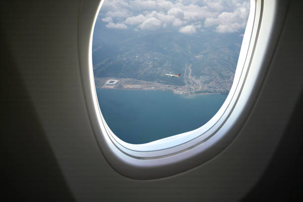 istock Commercial Airplane landing from airplane window. 2196794978