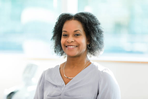 istock Confident African American Woman Smiling in Office 2196795074
