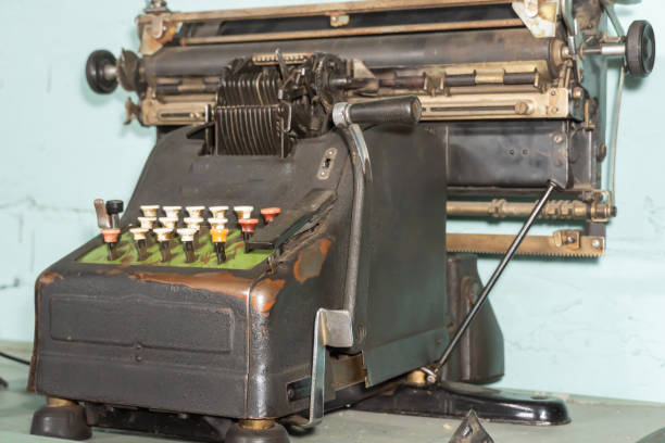 istock Old metal vintage typewriter close-up. Obsolete machine with keys. 2196798120