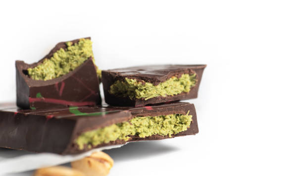 istock Decadent Chocolate with Pistachio Kunafa Filling on White Background 2196800293