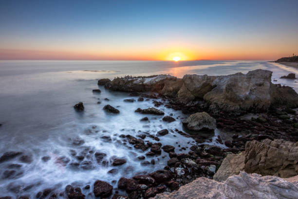 istock Sunset over the rugged cliffs of Malibu coast 2196801415