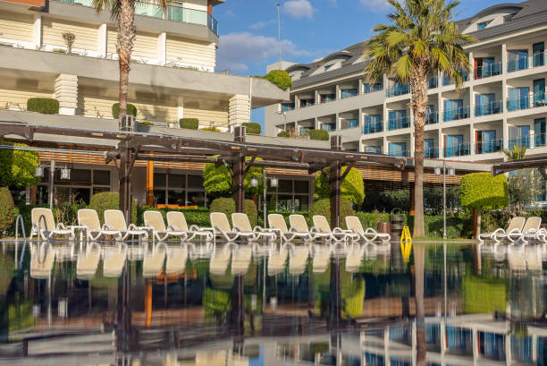 Tropical Hotel Resort and Pool with Lounge Chairs
