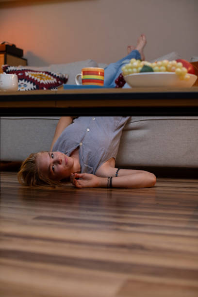istock An Artistic and Playful Perspective Enjoying a Relaxing Time Under the Coffee Table 2196803655