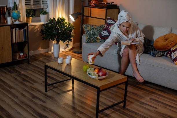 istock Enjoying a truly Relaxing Evening at Home while Surrounded by Delicious Snacks and Ultimate Comfort 2196804681