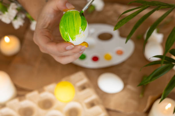 istock Springtime egg painting activity celebrates Easter with vibrant colors and creativity 2196806614
