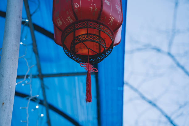 Chinese flashlight at the entrance to the store. Red Chinese Flashlight. High quality photo