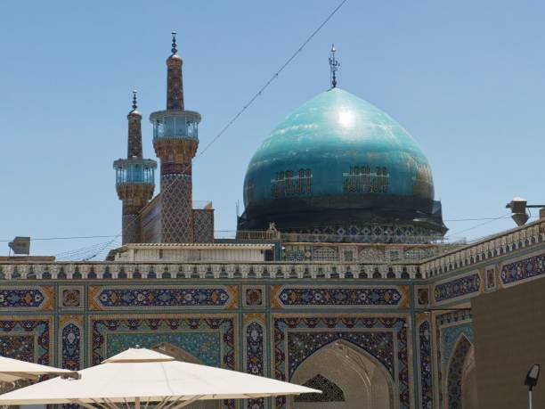 The Imam Reza Shrine is a pre - eminent and highly venerated religious complex located in Mashhad, Iran.