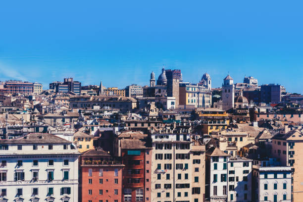 Genoa, Liguria, Italy - June 2, 2025: In Genoa, a seaside city, the old port reveals the essence of the city. The port, among boats and tourist attractions, is also a part of Genoa currently used as a residential neighborhood.