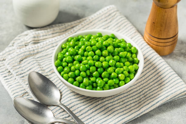 istock Organic Steamed Frozen Green Peas 2196817487
