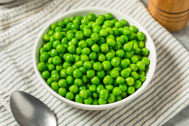 istock Organic Steamed Frozen Green Peas 2196817564