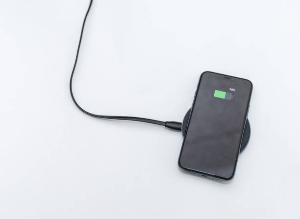 istock the phone is charged by wireless charging 2196818668