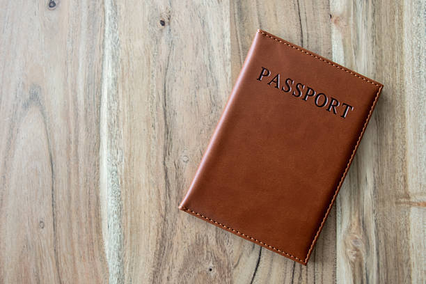 istock Passport with space for text on the wood background. 2196821113